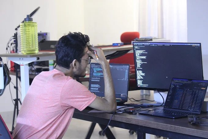 Deep in the code at the office